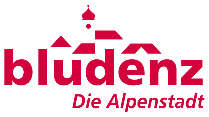 Logo der Stadt Bludenz in roter Schrift auf weißem Grund.